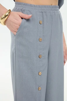 Костюм брючный 978-3 серый + листья мультиколор NikVa