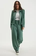 Костюм брючный 2694 зеленый Магия Моды